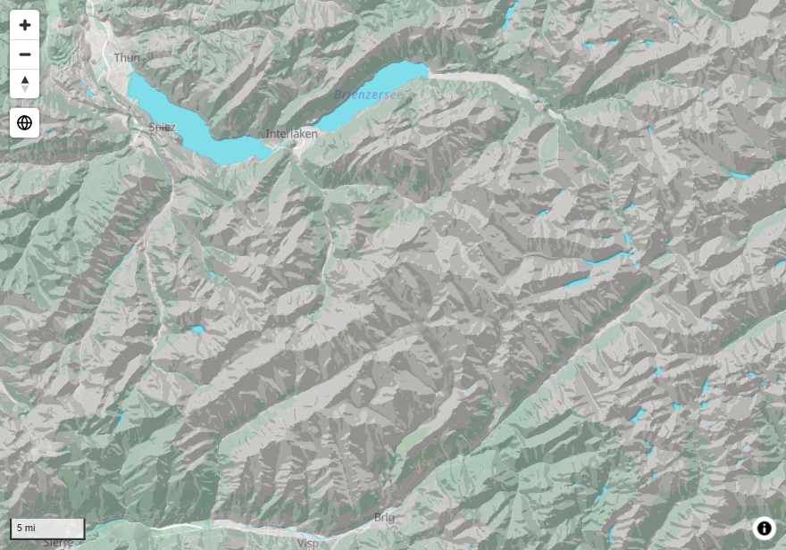 A mountain area with hillshade over a light basemap, viewed from straight above