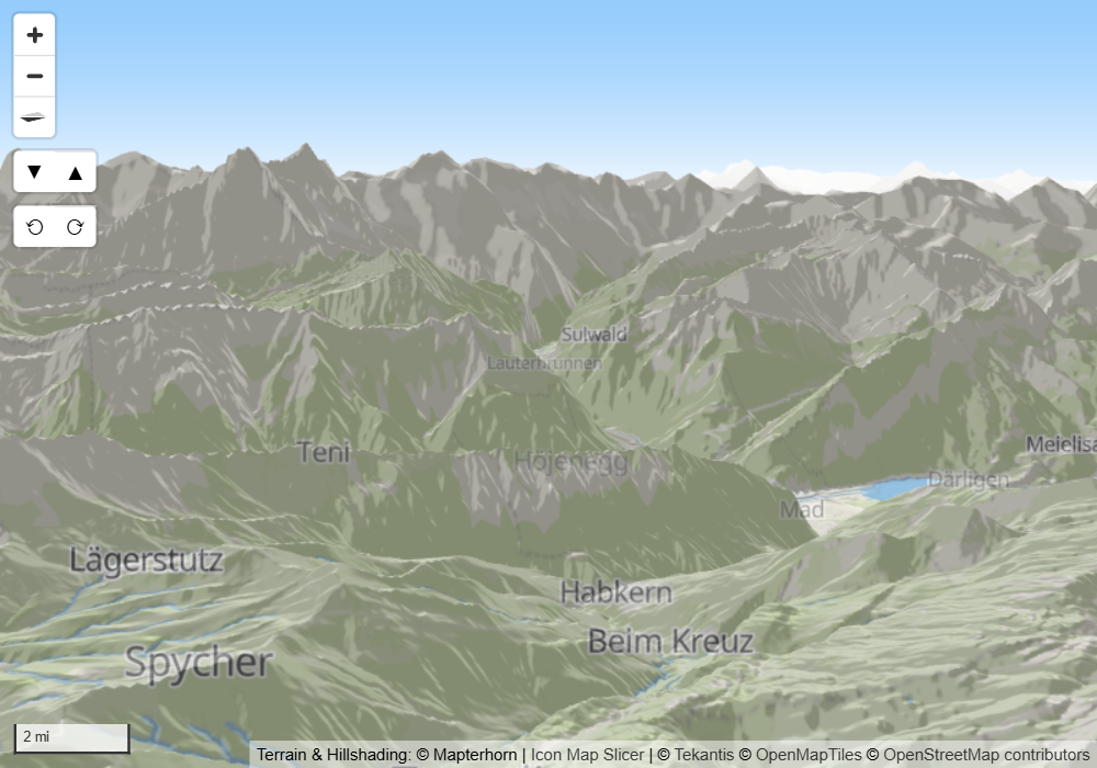 A steeply tilted map with fog fading distant hills into a pale horizon under a blue sky